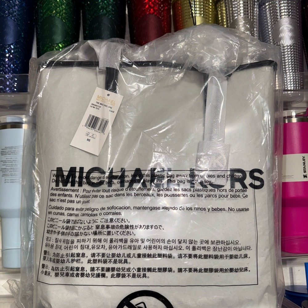 Michael Kors Clear Tote with silver charm